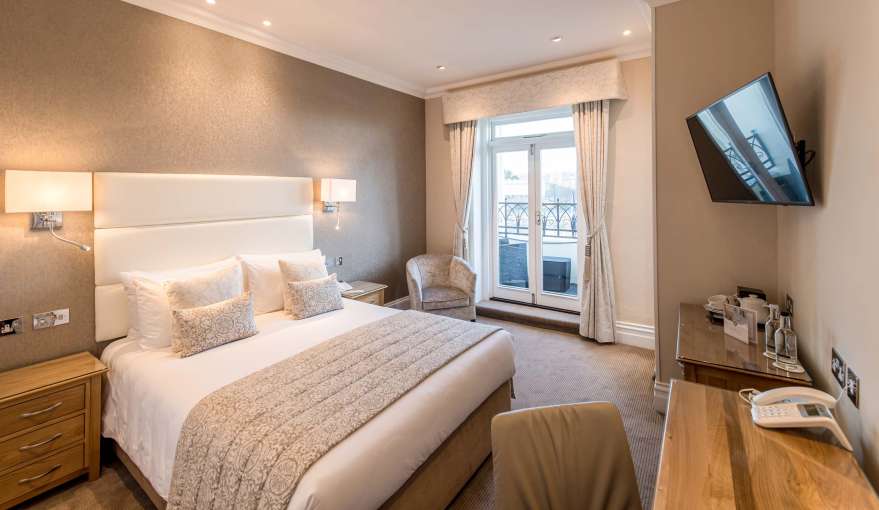 Imperial Hotel Accommodation (211) Bedroom with Desk and Seating Area