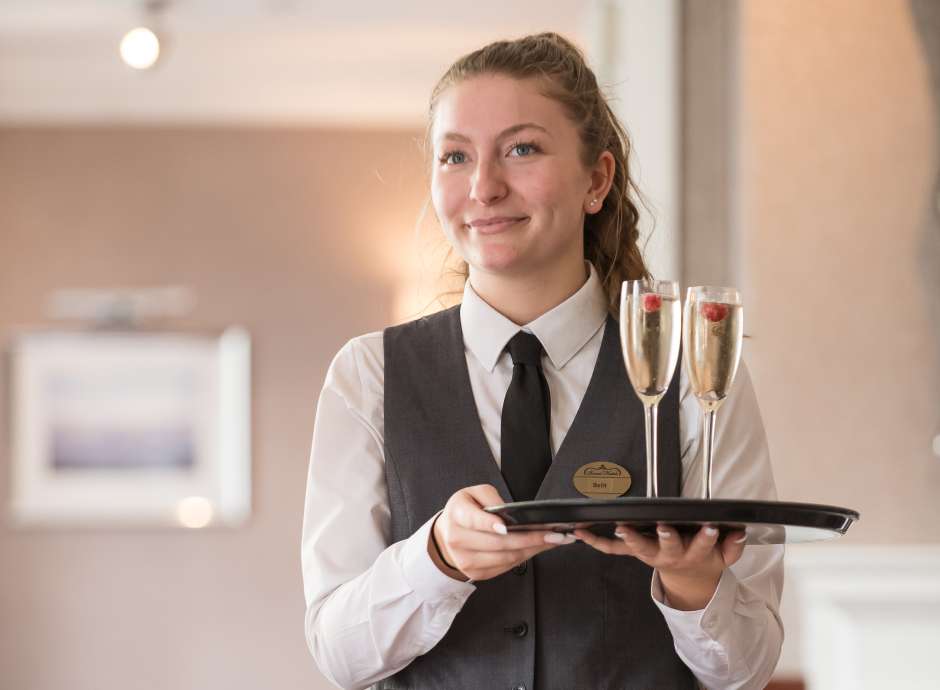 Waiting Staff Apprentice Carrying Prosecco